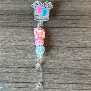 Scrub top badge reel